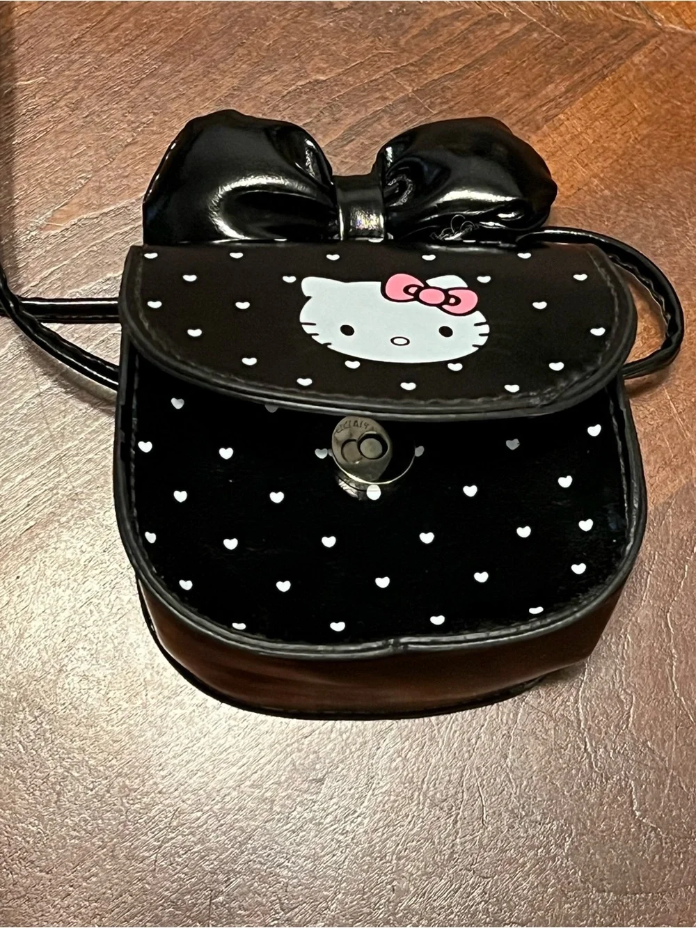 Hello Kitty Black Patent Mini Bow Crossbody Bag with Pink Bow Accent